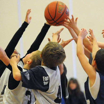 Meridian Ranch Bulldogs and Woodman Hills Tornados players battle for a rebound during their third-grade game Saturday, Jan. 29, 2011 at the Banning Lewis Ranch Academy. The Ascend Youth Sport Organization's elementary school league basketball was formed in December after District 49 discontinued it's elementary school basketball league. (The Gazette, Christian Murdock)